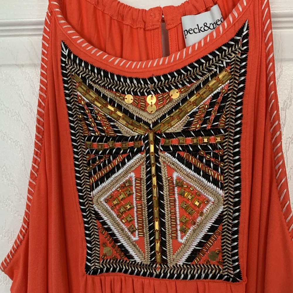 Coral embellished tank